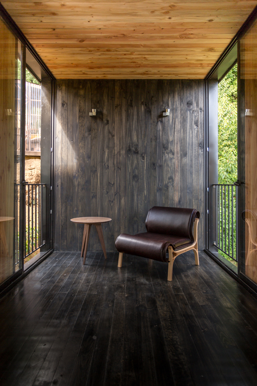 Yellow House — interior con terminaciones en madera, arquitecto Alejandro Soffia